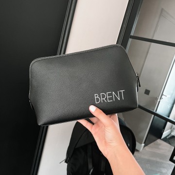 Zwarte toilettas met eigennaam